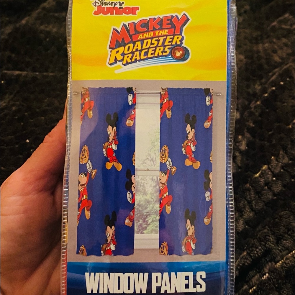 Mickey and the roadster racers curtain set, brand new, never taken out of bag.